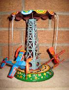      Japan Asahlinu Tin Litho Mechanical Carnival Moon Ride Toy