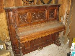 Schomacker & Co. Ornately Carved upright Piano