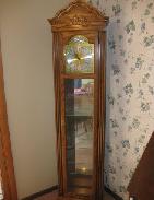 Howard Miller Oak & Brass Grandfather's Clock/Curio Shelf