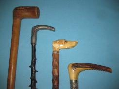 Gold & Carved Head Walking Sticks