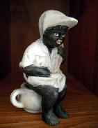 Black Memorabilia Bisque Child on Dime Potty Eating a Watermelon Slice