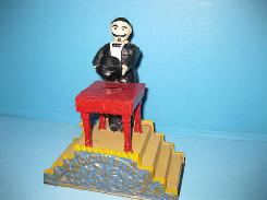 Magician Cast Iron Mechanical Bank