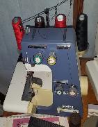 White Super Lock 534 Sewing Machine 