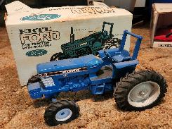 Ertl 1986 Ford 7710 Tractor w/ Roll Bar