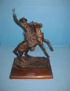 C. M. Russel Cowboy Bronze Statue