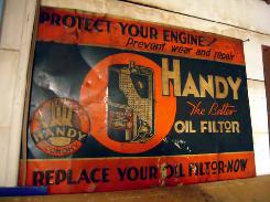 Handy Oil Filtor Embossed Metal Sign