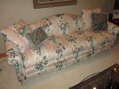 Floral Upholstered Camel Back Sofa