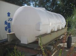 1,000 Gal. Poly Water Tank on JD H.D. Running Gear
