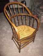 Walnut Cane Seat Captain's Tilting Chair