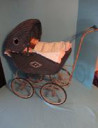 Antique Wicker Doll Stroller on Cast Iron Frame