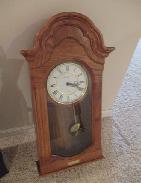 Howard Miller Dual Chimes Oak Wall Clock