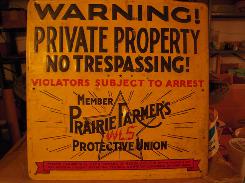 Prairie Farmer Embossed Tin Sign