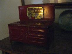 Little Orphan Annie Red Steel Pressed Stove