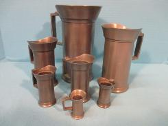 Early Pewter Graduated Pitcher Set