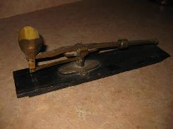 Early Brass Egg Scale